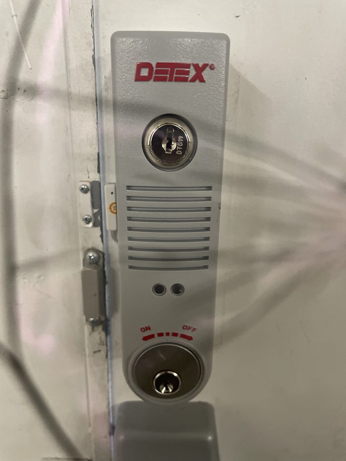 Commercial DETEX panic bar installed on exterior door